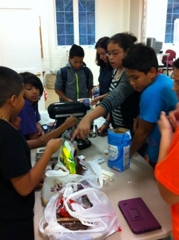 Teens Club Core works together to make cookies
